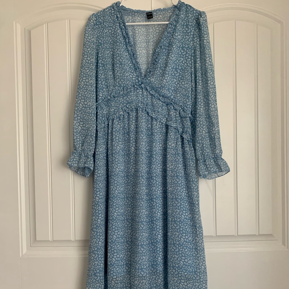 The top of the dress and sleeves are see through.